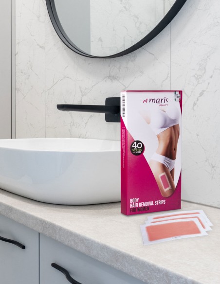 Confezione di strisce depilatorie appoggiate davanti a un lavandino